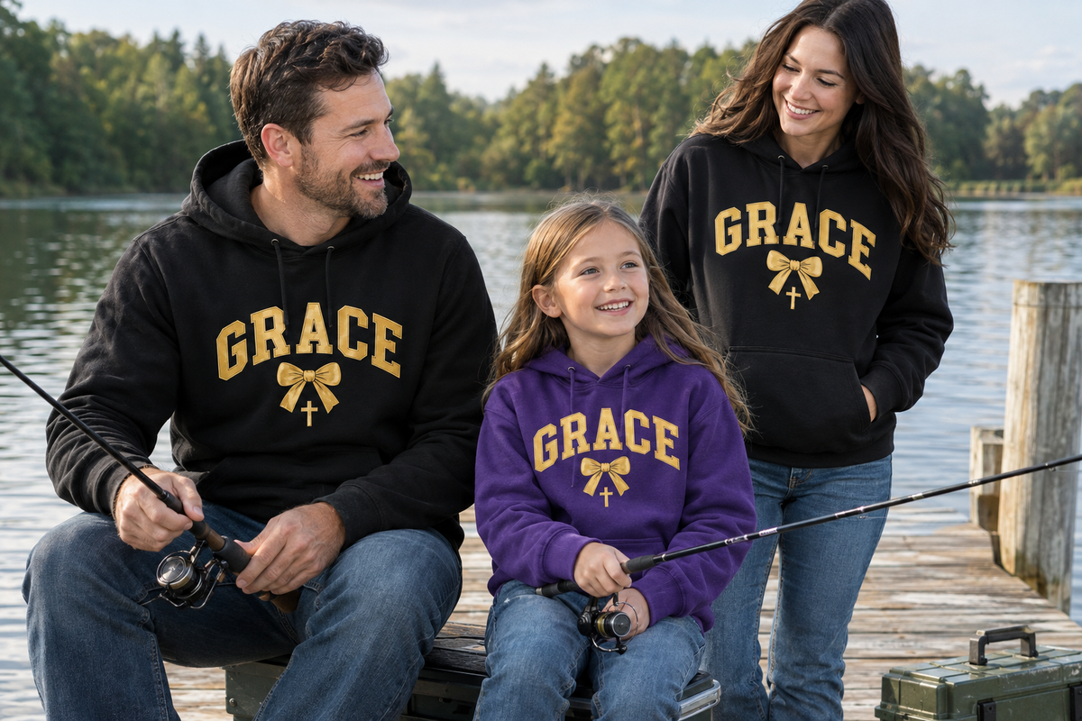 Family wearing GRACE hoodies while fishing