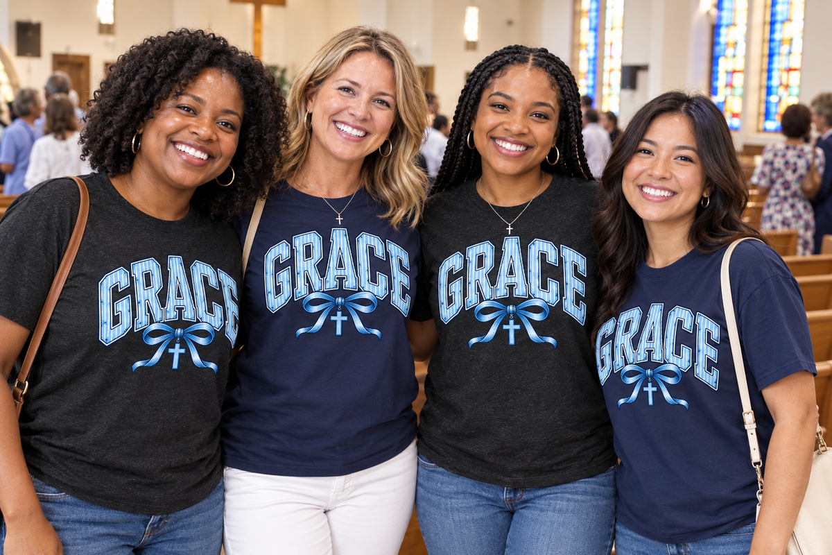 Church women gathered together in a sanctuary wearing the Grace blue bow and cross Christian t-shirt