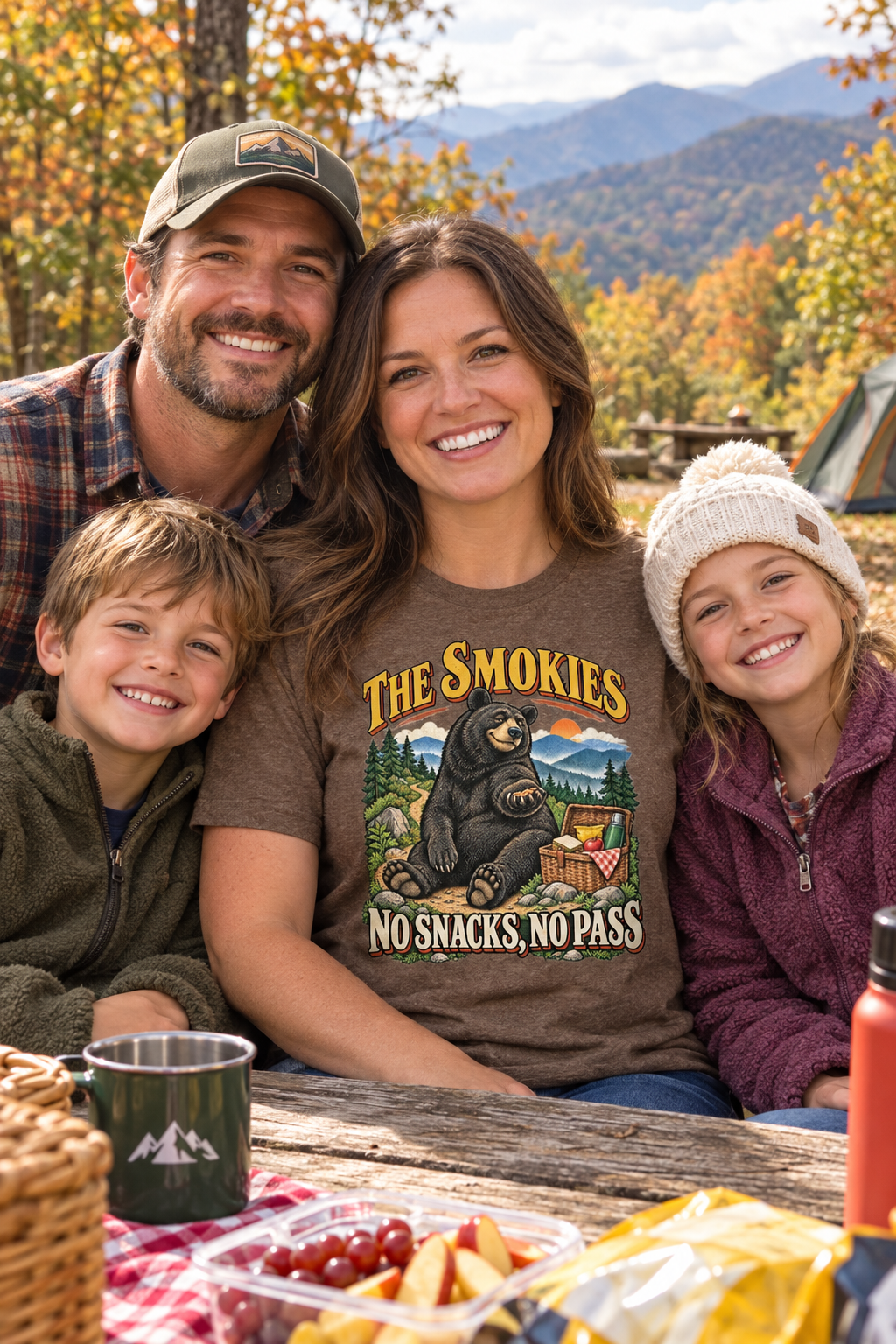 Family at a campsite picnic table wearing heather brown Smokies bear t-shirt
