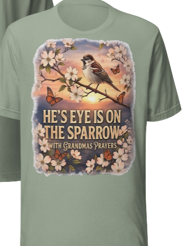 He's Eye Is On The Sparrow – With Grandma's Prayers | Faith T-Shirt